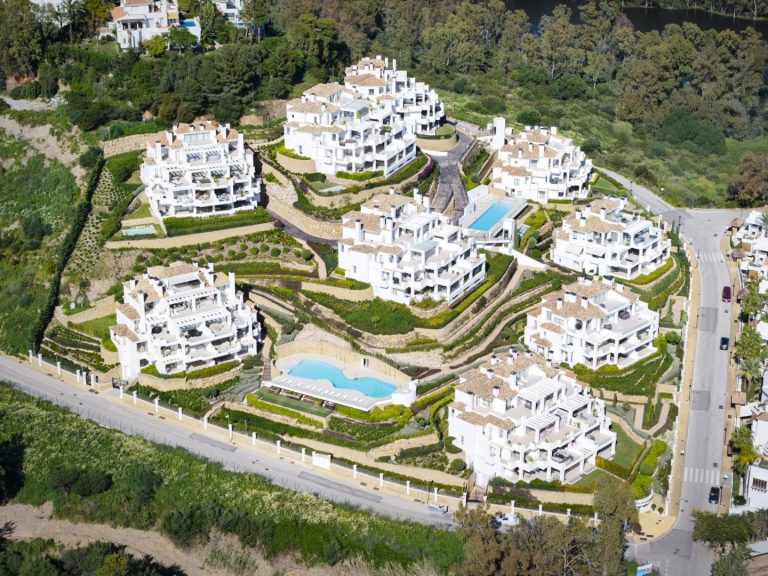 Aerial view of 9 Lions Residences in Nueva Andalucía, Marbella with sea and golf views